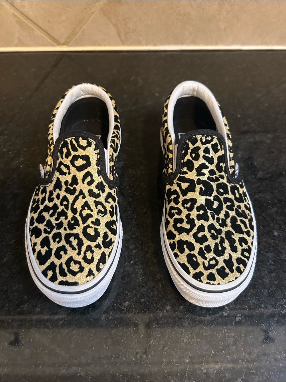 Vans Kids Slip-On Sneakers in Black & Gold Glitter Leopard